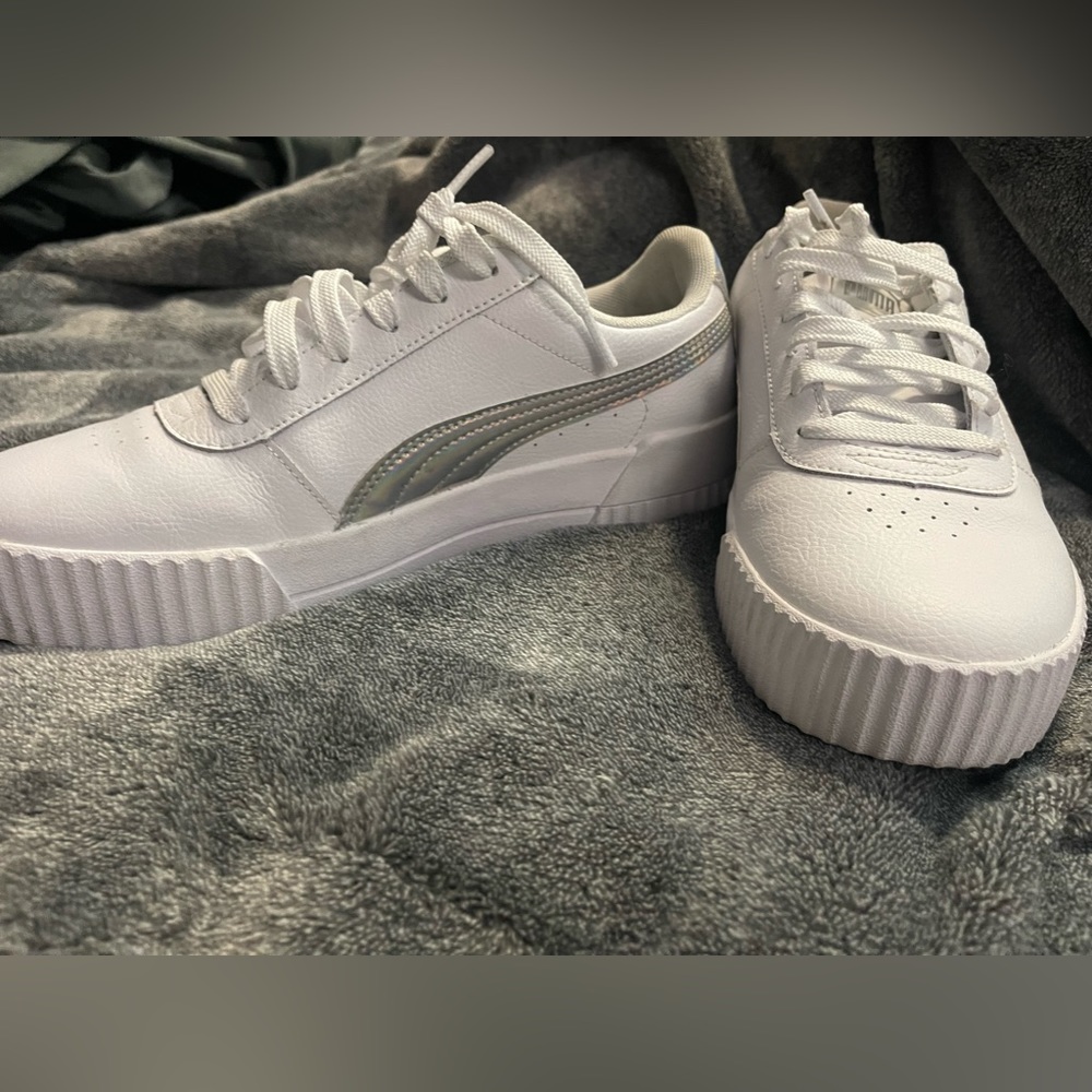 Puma white shoes in a women’s size 10.